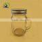 glass fruit juice bottle with golden lid