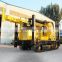Trailer mounted hydraulic rotary borehole drilling rig