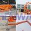 Hydraulic aerial articulated man lift towable cherry picker for sale