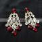 Innovative Designer Gold Plated Party Wear Earrings Set In Dark Red Color