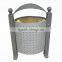 Metal and wooden outdoor trash bin