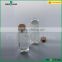clear glass drinking bottle with Wooden cap