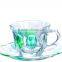 Color painted glass coffee tea cups and saucers