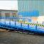Logistic equipment container unloading system