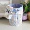 white wicker laundry basket cabinet