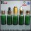 30ml  best seller cosmetic glass bottle with basket dropper cost price essential oil green glass dropper bottle wholesale