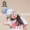 Superior Stable With Braids Fur Ball Beanie Hat