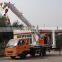 12 ton Chinese Tower crane truck crane Truck mounted crane price list