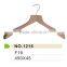 Wooden hanger with metal hook