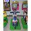 Kids playing arcade games machine kiddy ride children ride on motorcycle