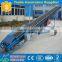 portable conveyor for truck unloading and loading bag or bulk materials