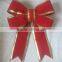 red velvet fabric giant bows with gold sides