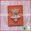 Red jeans synthetic metal crown leather patch label