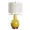 Factory wholesale home decor artificial ceramic table lamp for hotel design with fabric shade