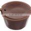 Brown food garde A plastic reusable capsule for Dolce Gusto machine