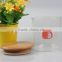 cylindrical jam/honey/cookies/storage bulk bee storage glass jars with bamboo lid wholesale
