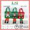 Green and red color christmas gift bag