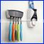Hot sell automatic hand free squeeze out toothpaste dispenser for bathroom accessories, children automatic toothpaste squeezer