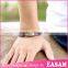 European fashion hollow out cross metal plate magnetic leather bracelet