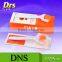 White handle orange head biogenesis dns derma roller for face and scalp treatment