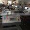 UGS2050 hot cold  mini table top automatic fabric woven label cutting machine, small garment wash care ribbon cutter