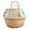 Pompom and tassel belly seagrass basket