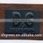 Glitter gold metal embossed logo on black leather