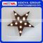 marquee light with five-pointed star shape with different colours