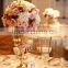Blush and white tall centerpiece. Dahlias, hydrangea, curly willow, roses, stock, dusty miler