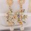 Latest design hot sale beautiful flower with pearl pendant earring