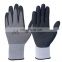Comfortable Tight Fitting 15G Nylon Spandex Sandy Finish Nitrile Coated Glove