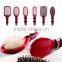 Raffini New Patterned Top selling Plastic with Swirl design Handle Paddle hairbrush