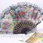 Spanish style plastic folding fan with flower
