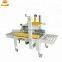 automatic broadside top and bottom folding carton box gluing sealer machine