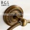 bath design with brass and Antique bronze finishing towel rings