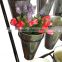 Morden stepped metal garden flower stand with white pots