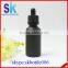 black frosted glass dropper bottle