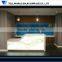 White lighted high glossy elegant beauty salon hotel reception counter