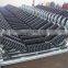 Conveyor carrier supporting roller idler