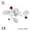 White chandelier with small red flower decoration in Russia style