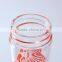 Best selling borosilicate /pyrex glass water/juice bottle with PP cap and colorful (red, black) decal