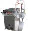 Big Volume 17L Double Nozzles Spout Bag Filling Machine For Liquid Oil Milk
