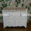 white wooden cabinet with 4 drawers and 2 locker/wooden cabinet with wicker drawers