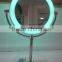 Single side free rotating stand mirror with bluetooth speaker