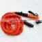 orange flexible elastic garden hose with free water gun
