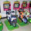 Kids playing arcade games machine kiddy ride children ride on motorcycle
