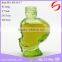 green skull shape glass bottle for perfume