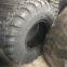 Two busy tires 12.5/80-18 16.9-28 vacuum tire loader R-4