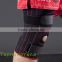 Compression neoprene knee support with adjustable spring support
