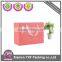 Pink paper bag with ribbon decoration